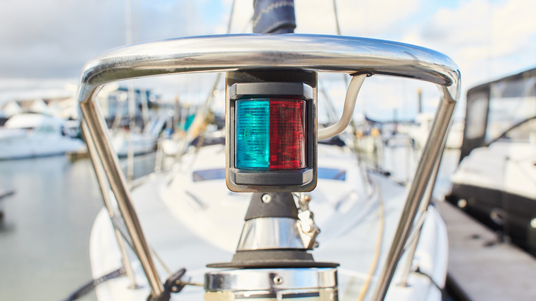 Sailboat bow with red and green navigation lights