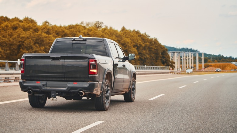 Truck driving in left lane