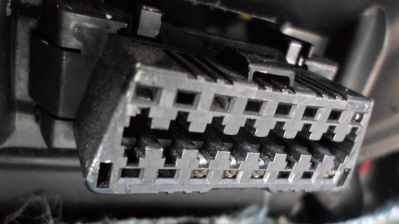 close up view of an onboard ODB-II port connector