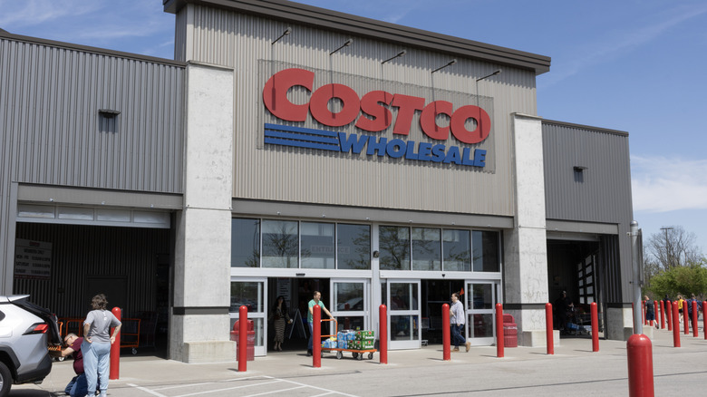 Shoppers outside of a Costco warehouse