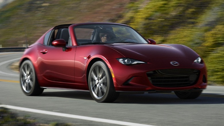 2025 Mazda MX-5 Miata driving on winding mountain road