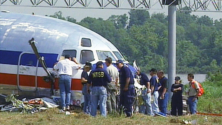 NTSB investigators surround the wreckage of an American Airlines plane crash