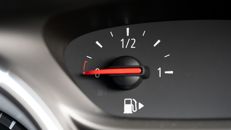 A fuel gauge showing an empty fuel tank