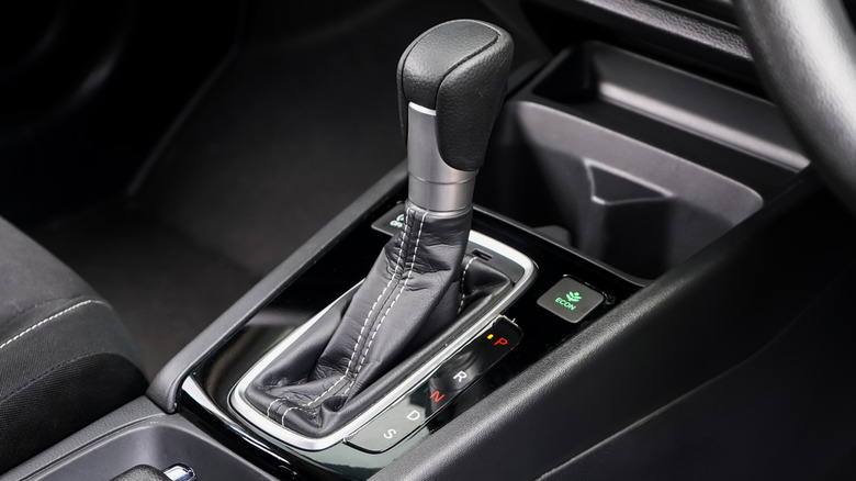 Gear shifter in car with "S" visible