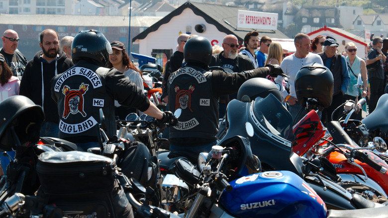 Satan's Slaves motorcycle club members riding on the seafront at Paignton