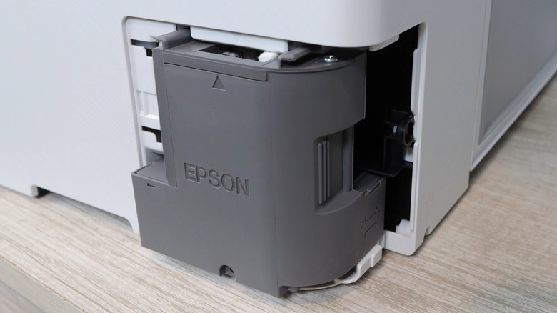Epson printer on a table with maintenance box detached