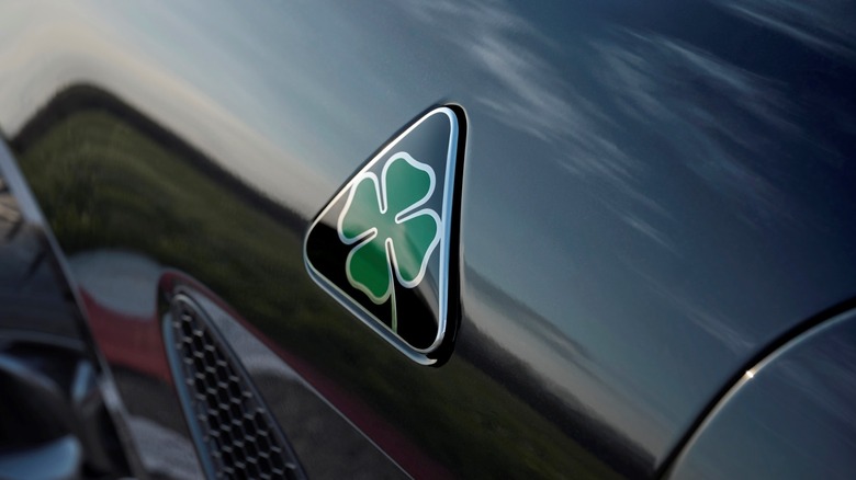 Shot of the Alfa Romeo four-leaf clover emblem emblazoned on the 2024 Alfa Romeo Giulia Quadrifoglio Super Sport