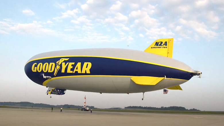 Goodyear Blimp taking off from airport
