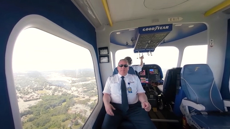 Crew piloting the Goodyear Blimp