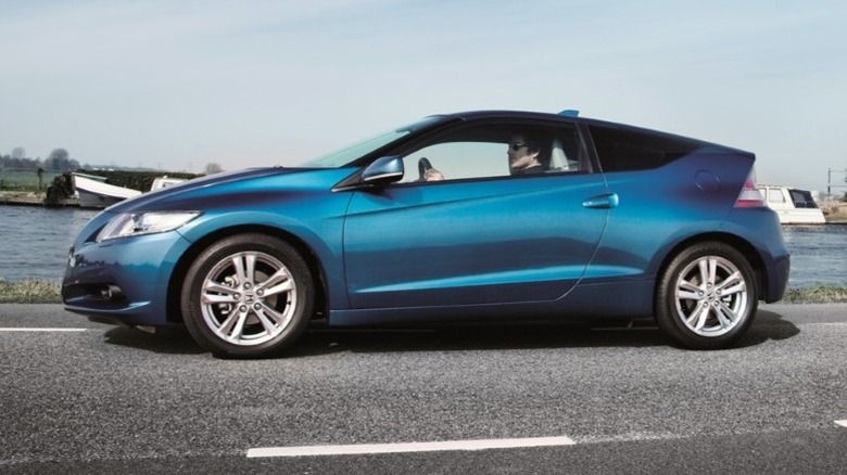 Honda CR-Z parked next to a body of water