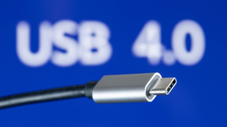 A USB4 cable with the USB 4.0 written in the background