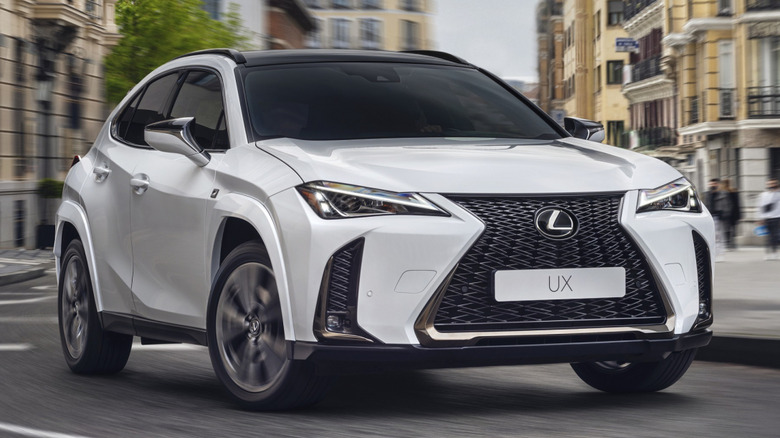White 2025 Lexus UX 300h F Sport cornering