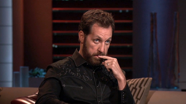 Shark Tank star listening to Getaway pitch