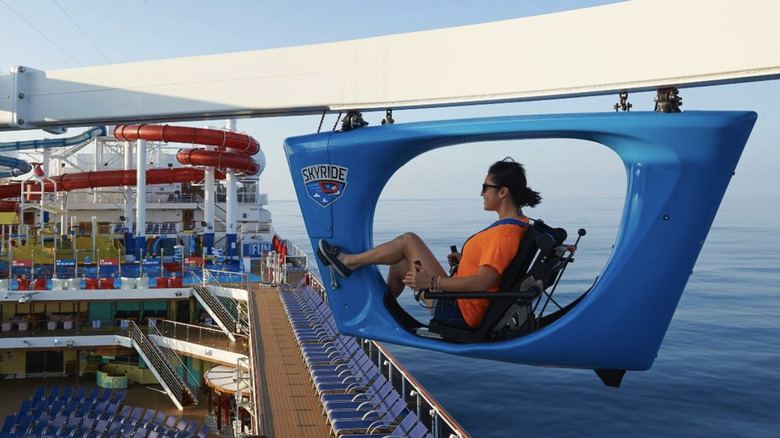 A female passenger using one of SkyRide's monorail on a cruise ship.