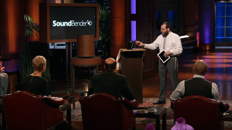 The sharks observing Moshe demonstrate the SoundBender on Shark Tank