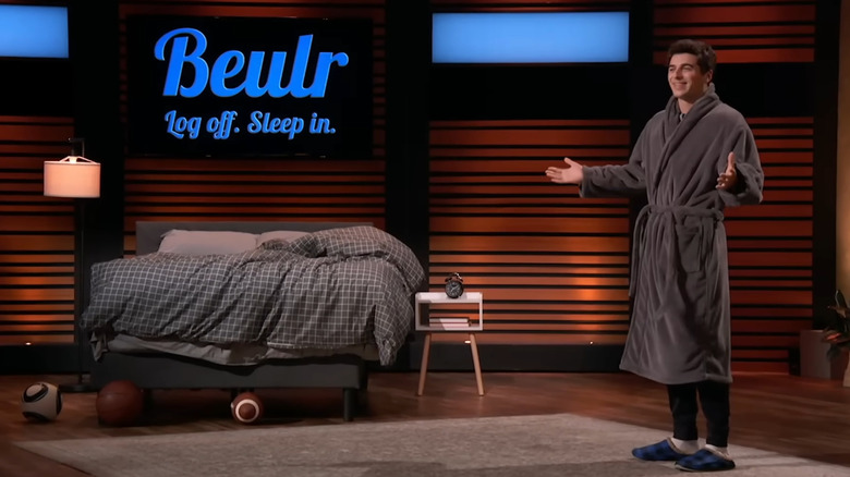 Peter standing next to Beulr display