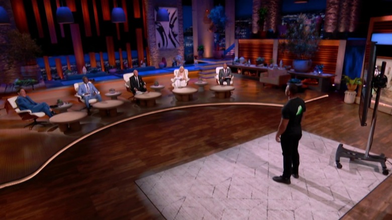 The five sharks listening intently to Destin Bell's Card.io presentation