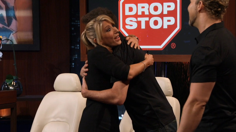 Lori hugging Marc on Shark Tank