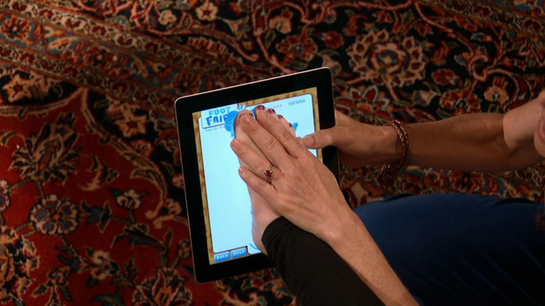 Founders of Foot Fairy showing how the app works