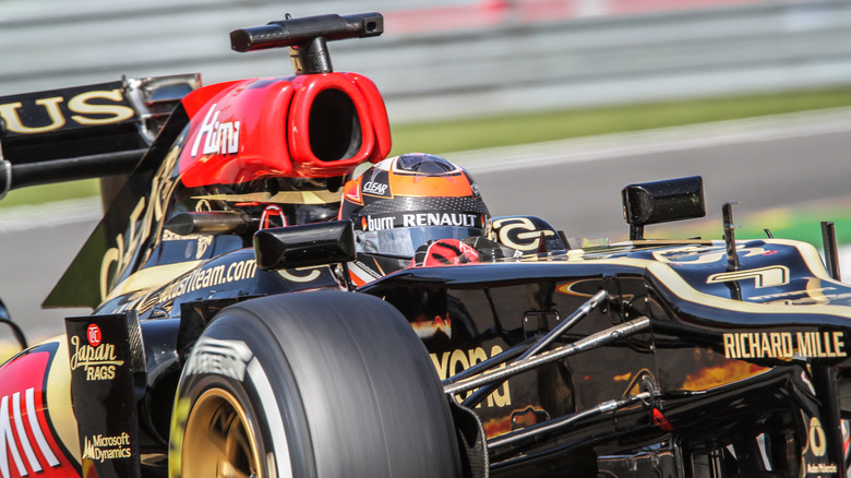 Kimi Raikkonen in a Lotus F1 car