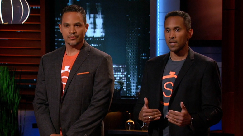 Greg speaking next to Ben on Shark Tank