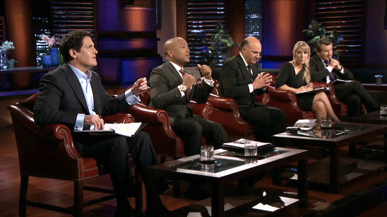 Shark Tank panel listening to Zomm Pitch