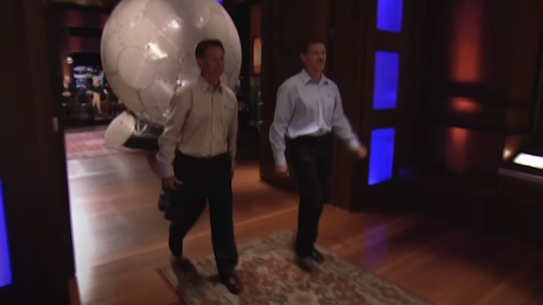 Virtusphere co-founders exiting the tank after their presentation.