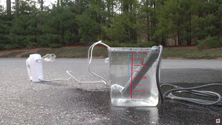 Power strip in a jug of water