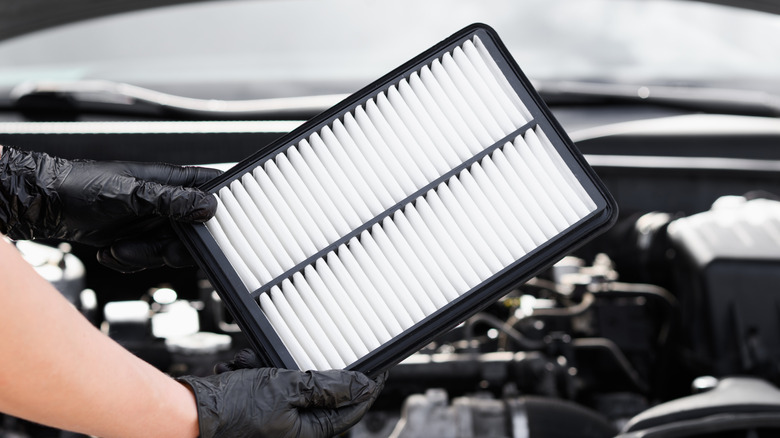 Picture of a clean car cabin air filter held in hand