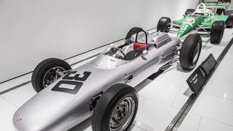 1962 Porsche 804 Formula 1 cars in exhibit, front-left view from eye-level