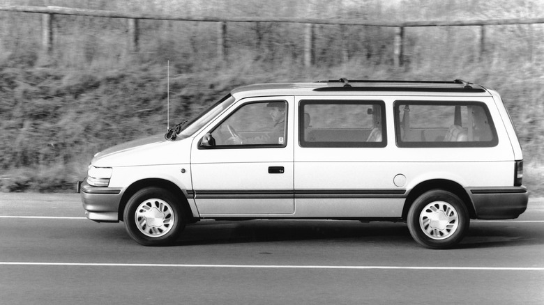 1993 Plymouth Grand Voyager, left-side view, black-and-white photograph