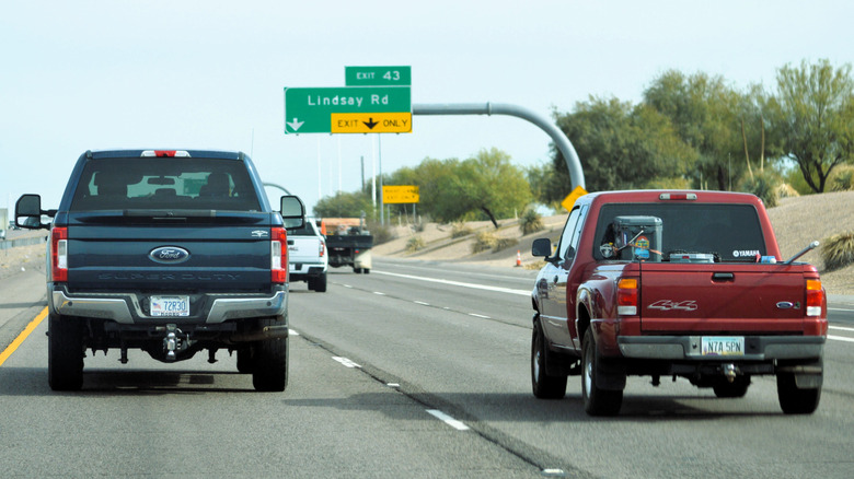 Rear shot of both Fleetside and Stepside Ford pickup trucks