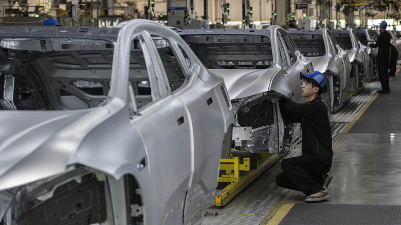 Chinese cars being produced on assembly line
