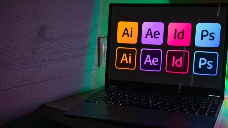 Logos of Adobe apps on laptop