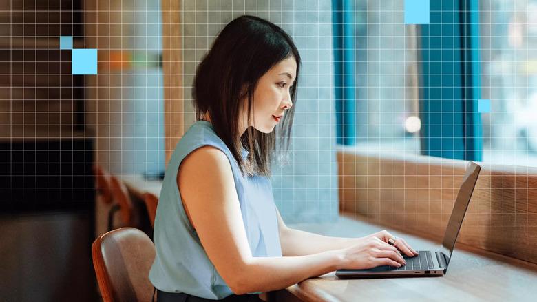 Person typing on laptop