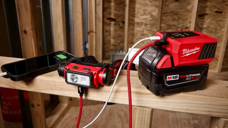 The Milwaukee Tool M18 Top-Off Charger charges electronic devices.