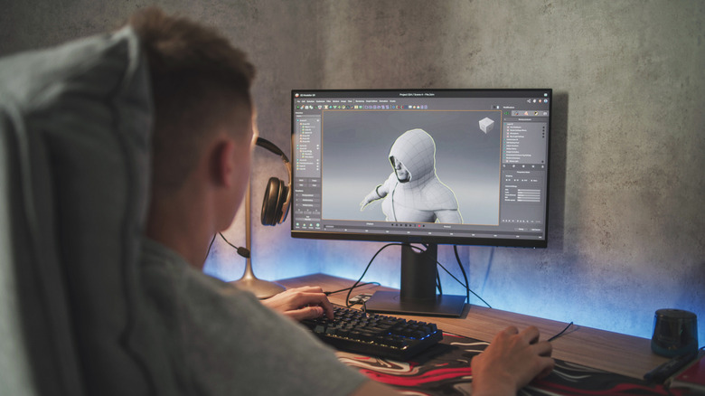 A video game developer designing a 3D model