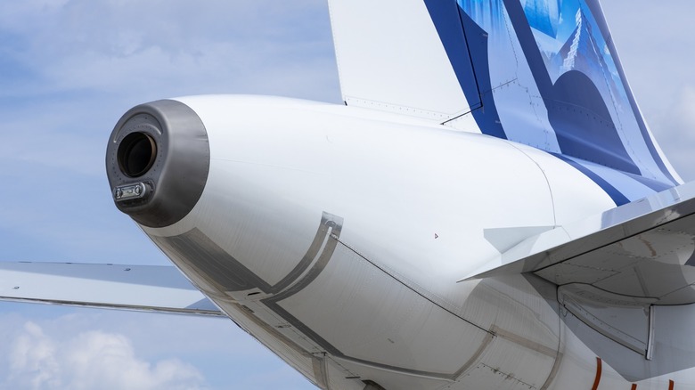 APU exhaust and tail of an airplane