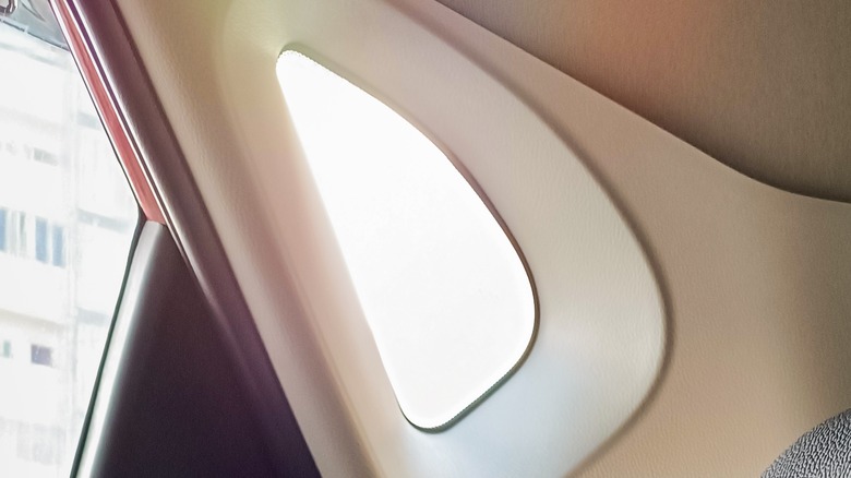 A quarter glass window seen from the inside of a car.