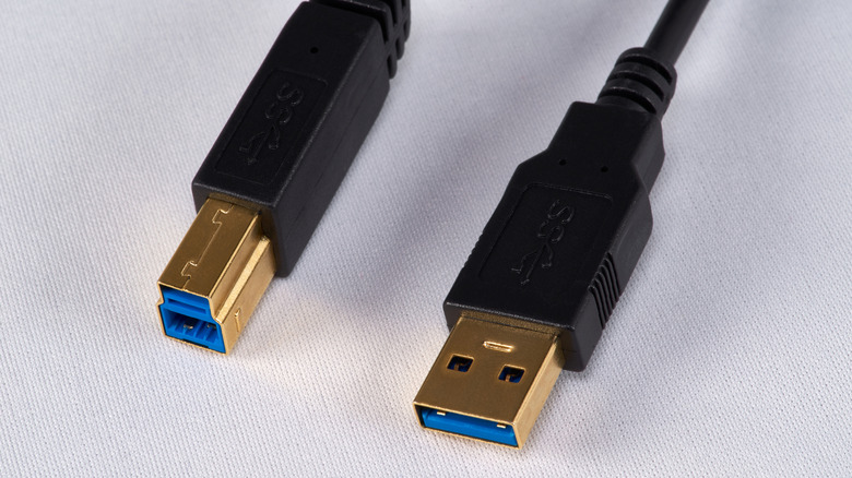 Close up of USB A to USB B black cable