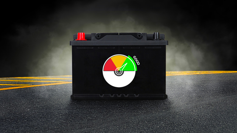 Car battery isolated with smoke on highway