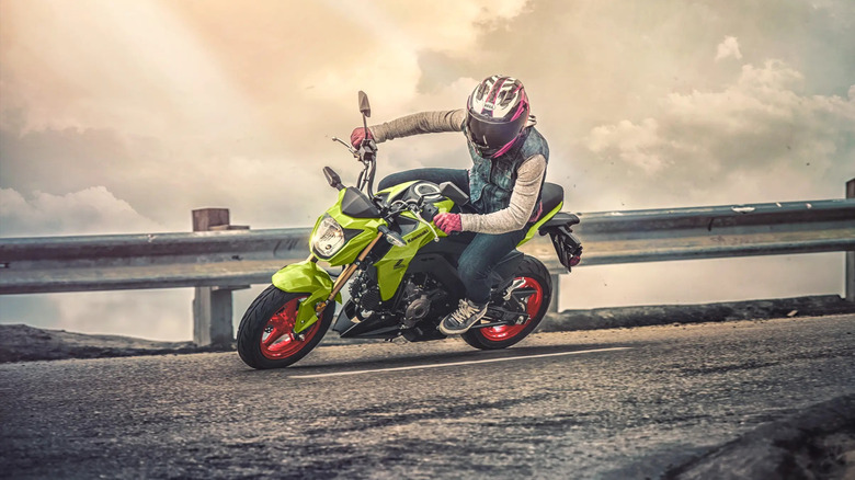 Person riding a Kawasaki Z125 Pro mini bike