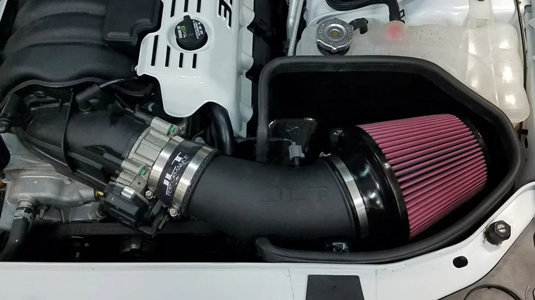 A JLT cold air intake installed in a Dodge Charger