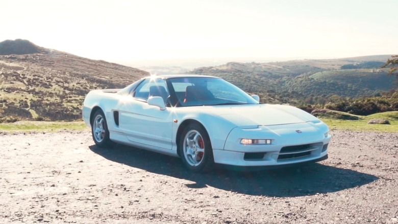 white Honda NSX type R parked on mountain