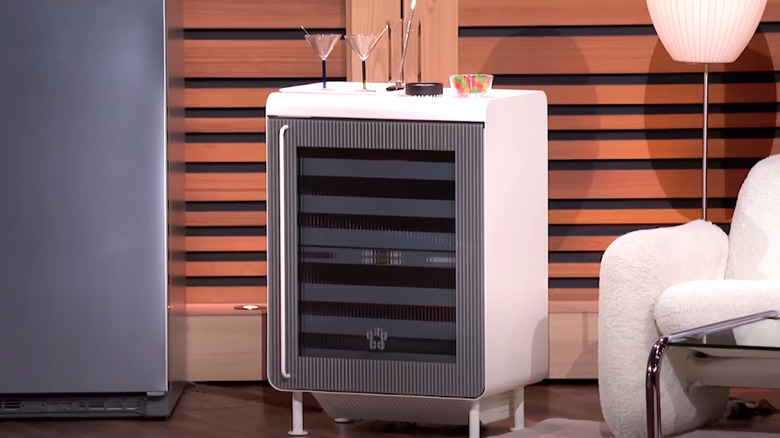 Martini glasses sitting on top of a Rocco Smart Fridge