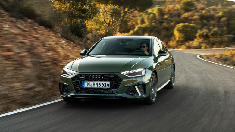 Front 3/4 view of 2025 Audi A4 in green