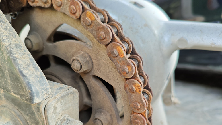 Rusty motorcycle chain is a sign of neglect