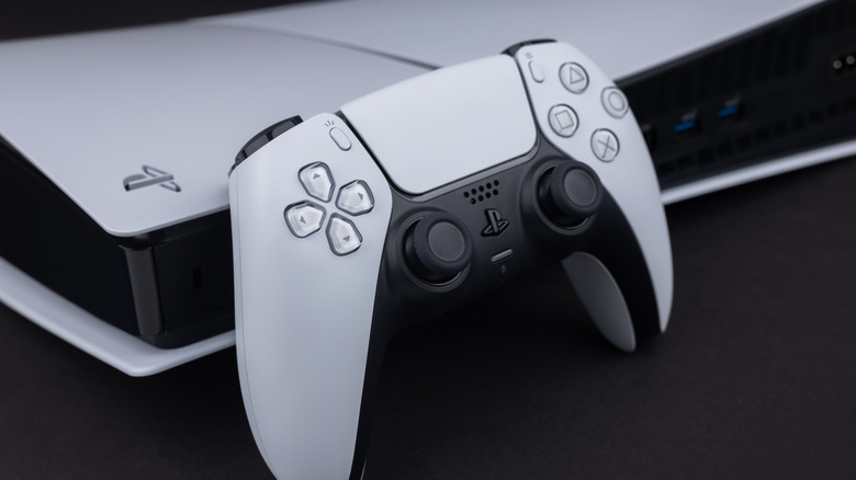 PS5 and PS5 DualSense controller on table