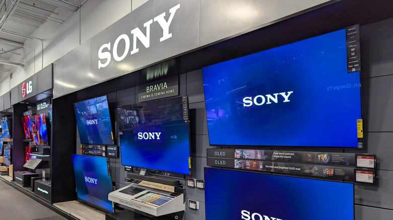 A display of Sony and LG televisions at a Best Buy store