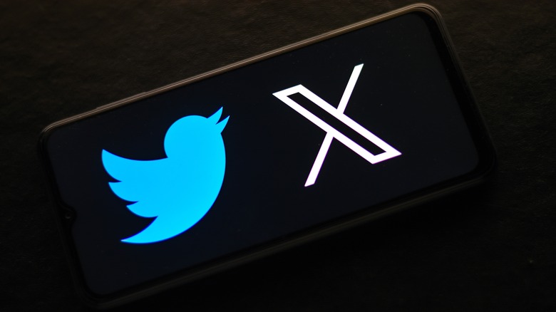 A smartphone with the Twitter and X logos